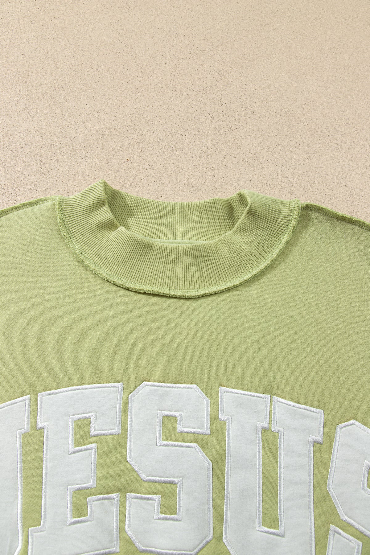 Meadow Mist Green JESUS Letter Patch Graphic Exposed Seam Mock Neck Baggy Sweatshirt PREORDER ETA 3 WEEKS