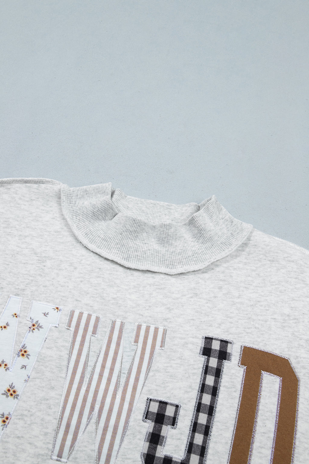 Gray WWJD Mixed Pattern Embroidered Patch Graphic Mock Neck Sweatshirt PREORDER ETA 3 WEEKS