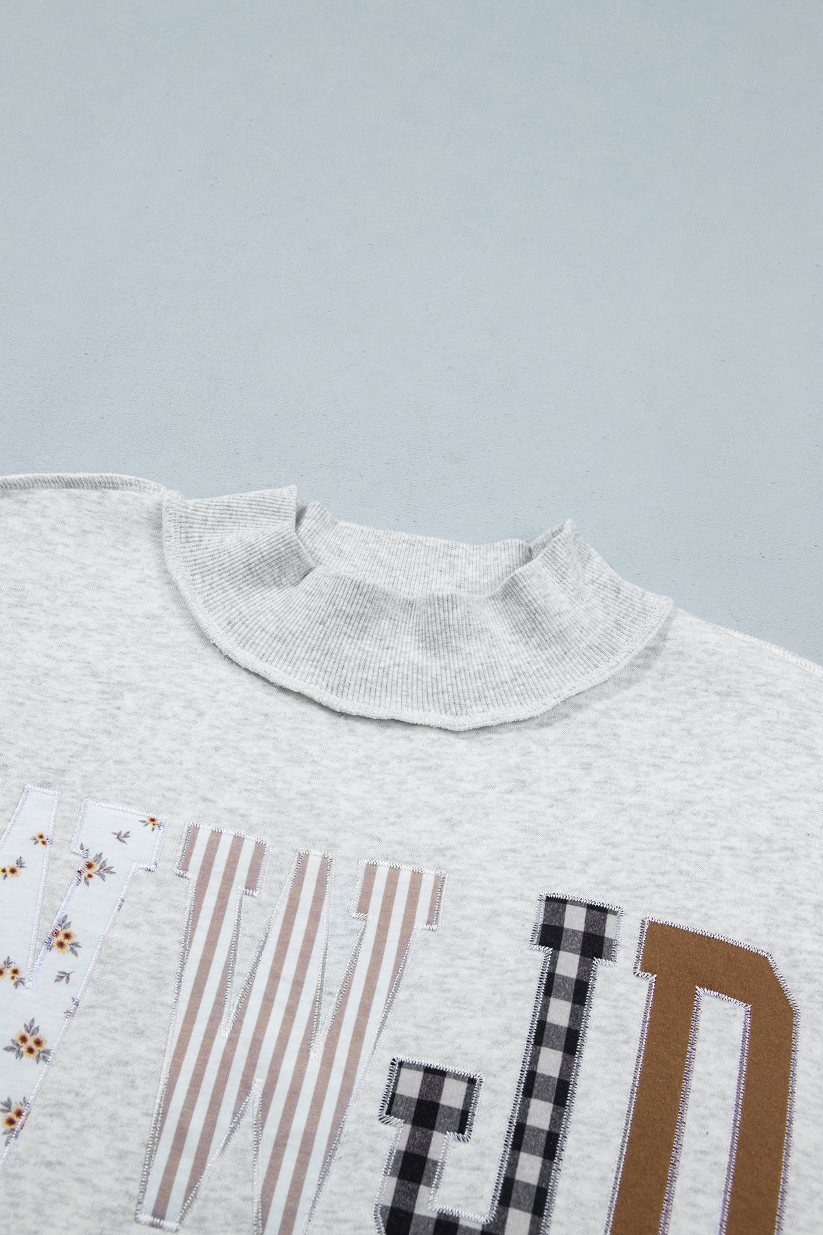 Gray WWJD Mixed Pattern Embroidered Patch Graphic Mock Neck Sweatshirt PREORDER ETA 3 WEEKS