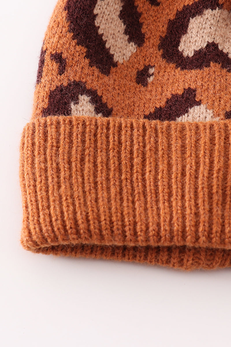 Brown pompom leopard cable beanie hat