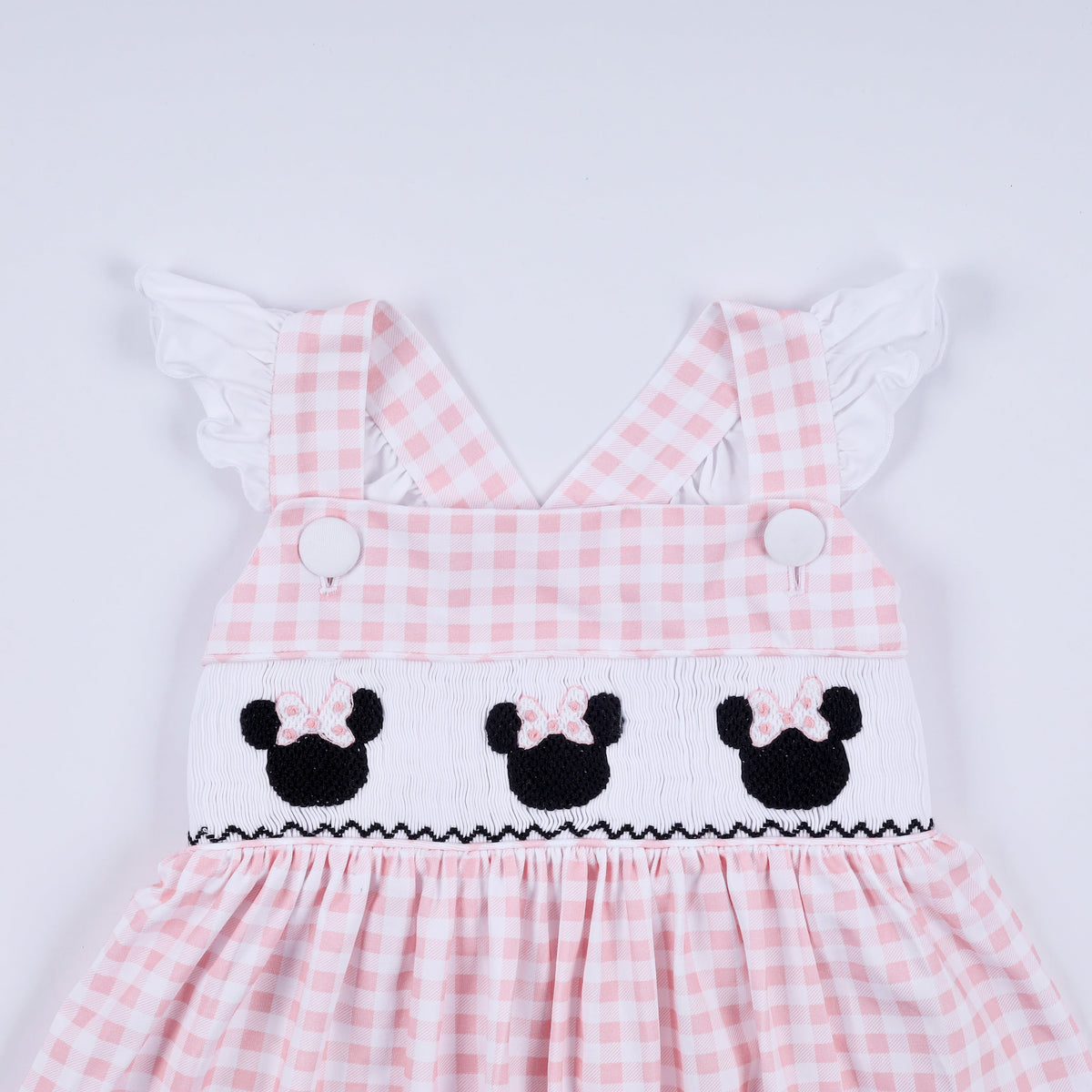 Pink character hand smocked gingham ruffle dress