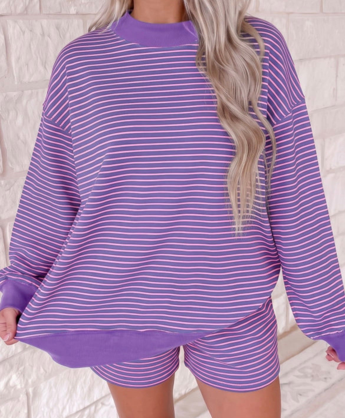Purple and pink striped mock neck sweatshirt and matching shorts
