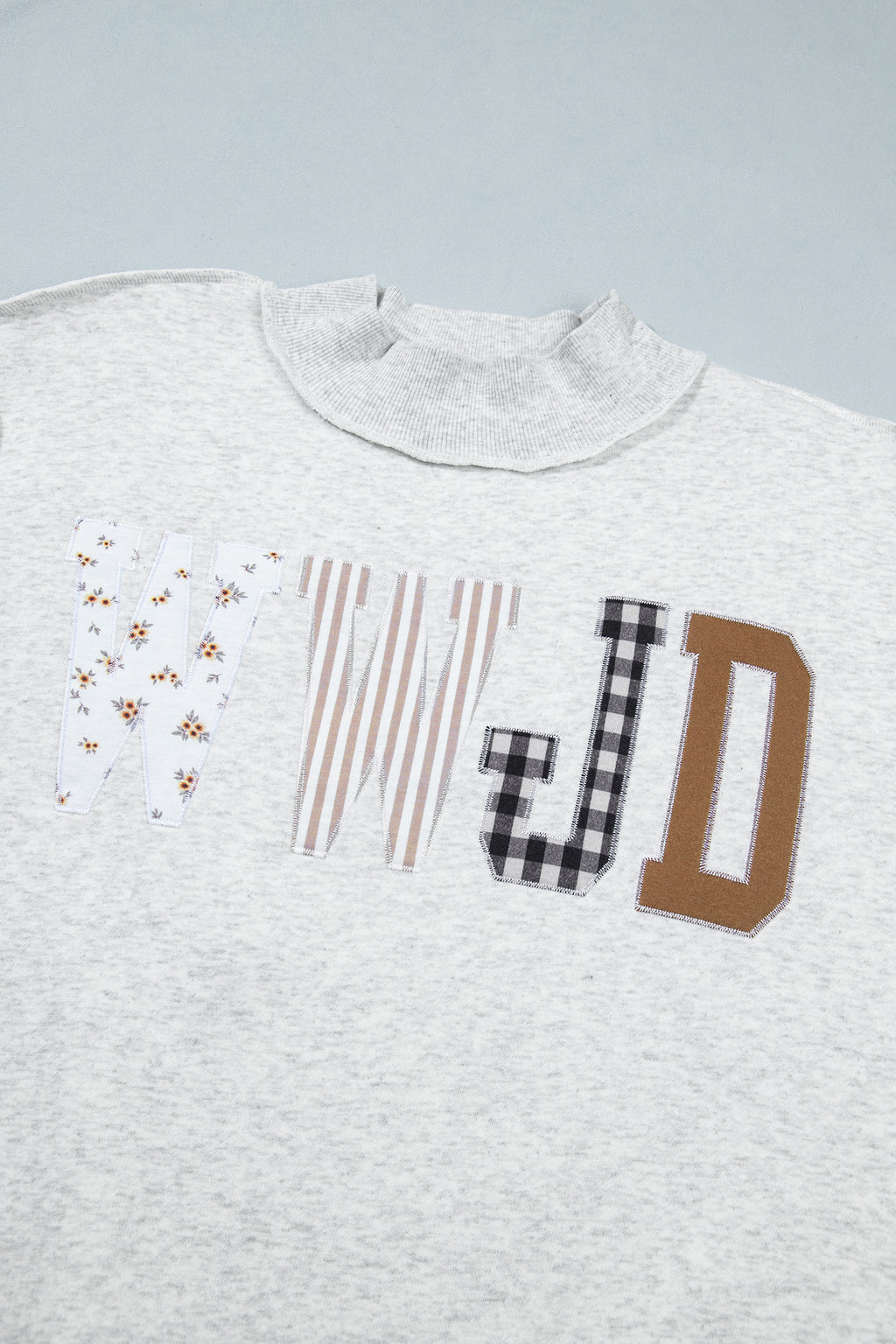 Gray WWJD Mixed Pattern Embroidered Patch Graphic Mock Neck Sweatshirt PREORDER ETA 3 WEEKS