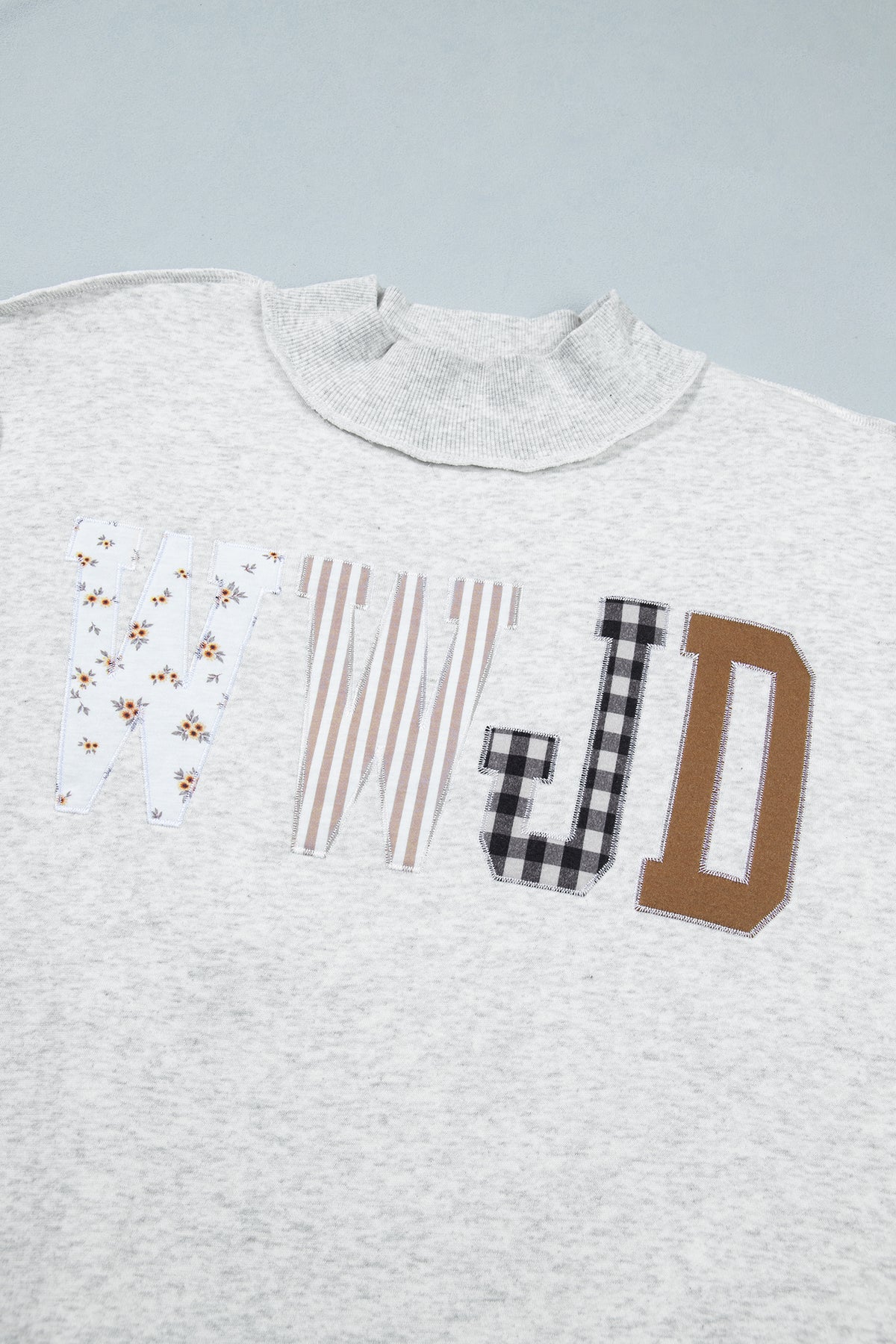 Gray WWJD Mixed Pattern Embroidered Patch Graphic Mock Neck Sweatshirt PREORDER ETA 3 WEEKS