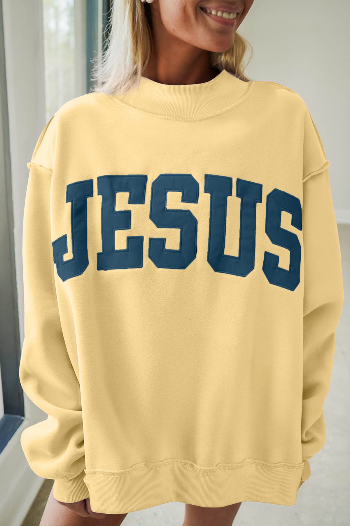 Banana Cream JESUS Letter Patch Graphic Exposed Seam Mock Neck Baggy Sweatshirt PREORDER ETA 3 WEEKS