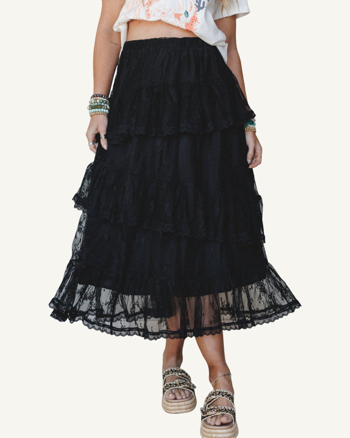 Black Elegant Ruffle Lace Tiered Skirt — ivory studio background